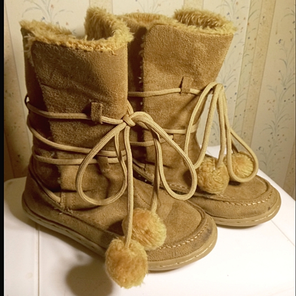 Tan colored, girls size 4 moccasin style boots